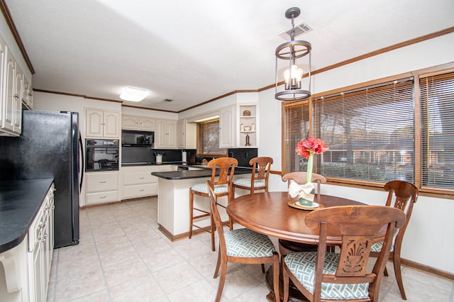 dining room with crown molding and a textured ceiling