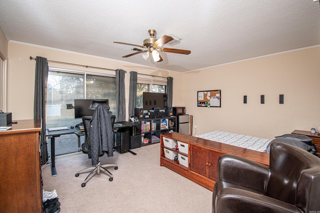 carpeted home office featuring ceiling fan and a textured ceiling