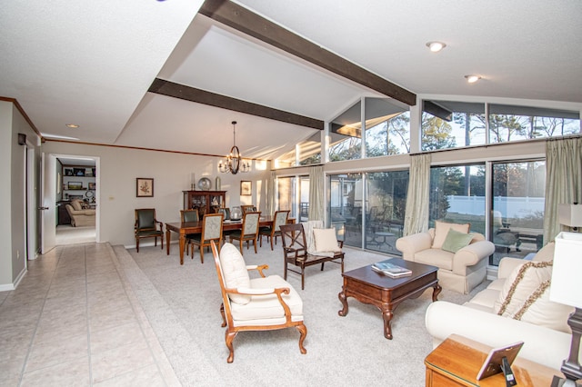 living room featuring a chandelier and vaulted ceiling