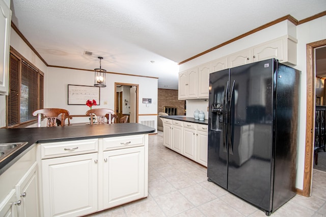 kitchen with white cabinetry, hanging light fixtures, a notable chandelier, crown molding, and black fridge with ice dispenser