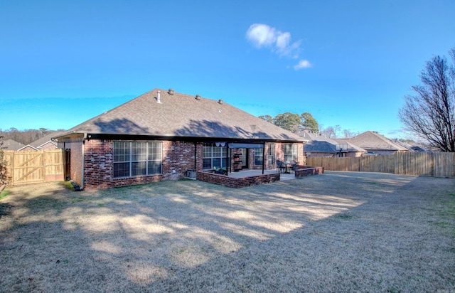 rear view of house with a patio area