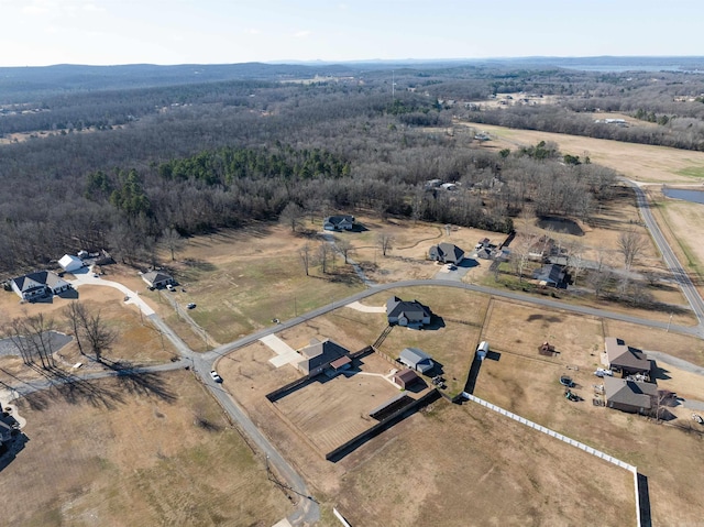 birds eye view of property with a rural view