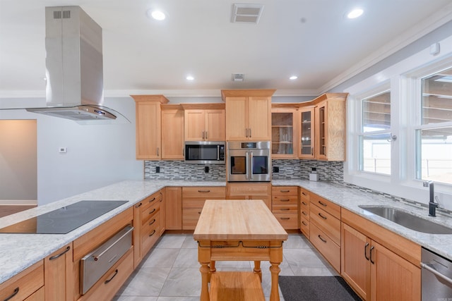 kitchen with sink, light brown cabinets, stainless steel appliances, wood counters, and island exhaust hood