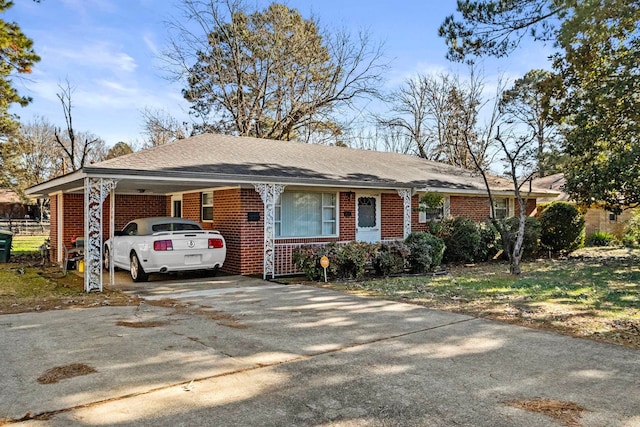 view of front of house featuring a carport