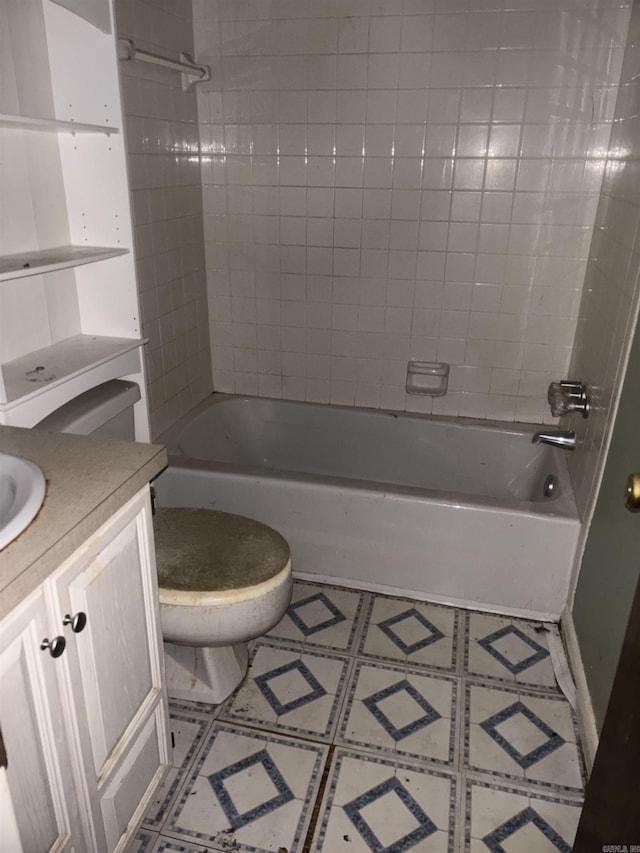 full bathroom with bathing tub / shower combination, vanity, and toilet