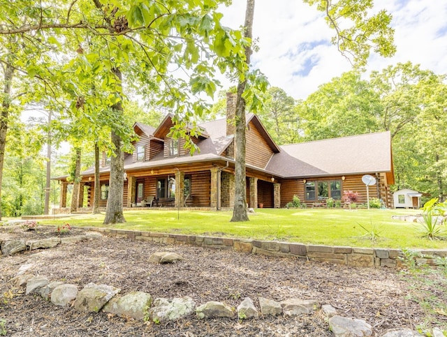 view of front of home with a front yard