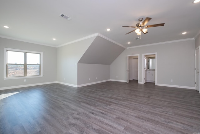 bonus room with vaulted ceiling, ceiling fan, and dark hardwood / wood-style floors