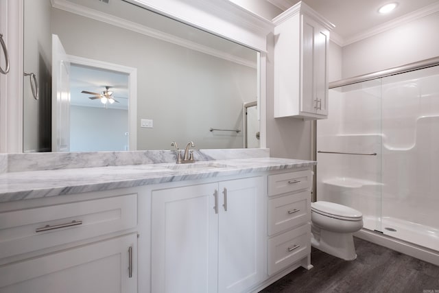 bathroom featuring vanity, crown molding, ceiling fan, an enclosed shower, and wood-type flooring