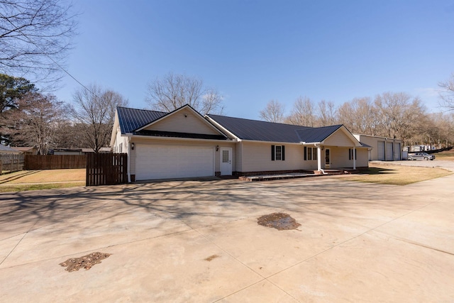 ranch-style house featuring a garage