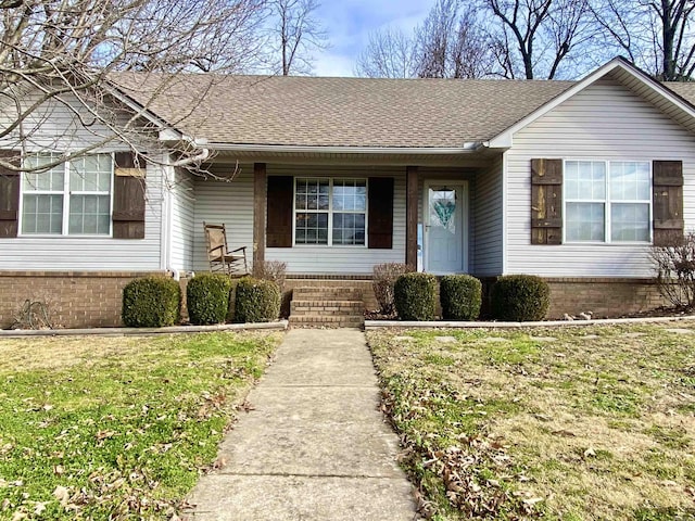 view of front of house with a front lawn