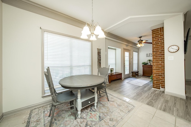 dining space featuring ceiling fan with notable chandelier, light hardwood / wood-style floors, and ornamental molding