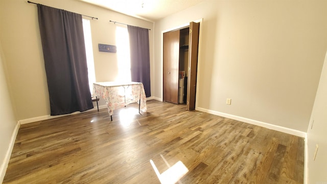 empty room featuring hardwood / wood-style floors