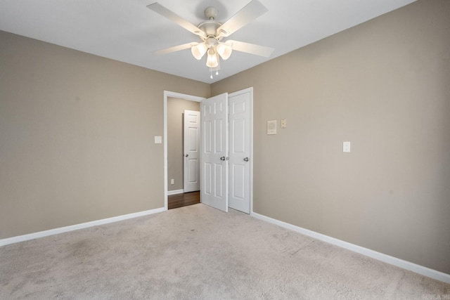 unfurnished bedroom with carpet flooring and ceiling fan