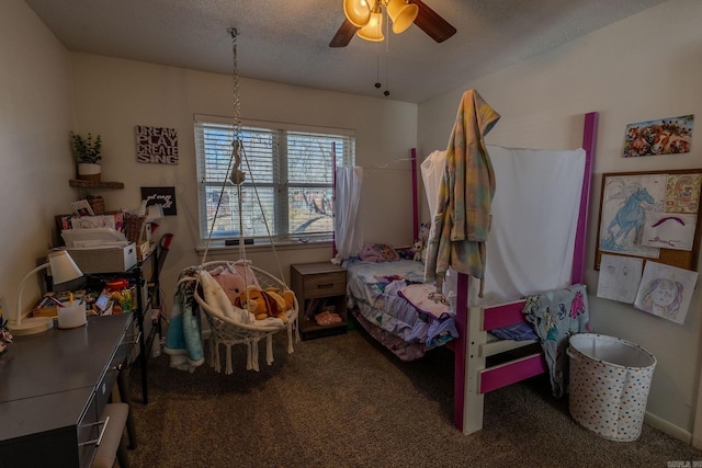 bedroom with carpet flooring, a textured ceiling, and ceiling fan