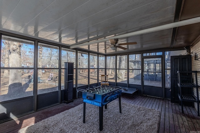 sunroom / solarium with ceiling fan