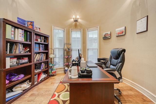 home office featuring light hardwood / wood-style flooring