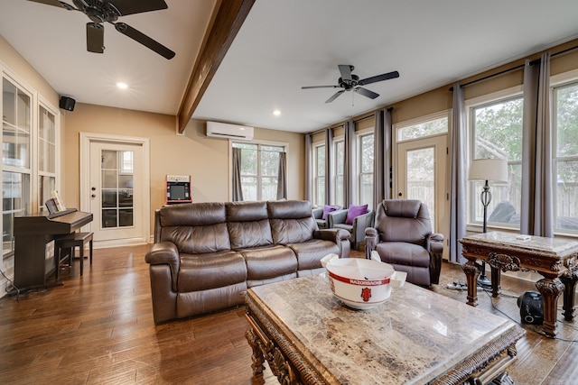 living room with a wall unit AC, ceiling fan, beamed ceiling, and dark wood-type flooring