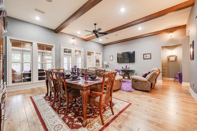 dining area featuring beam ceiling, ceiling fan, and light hardwood / wood-style floors