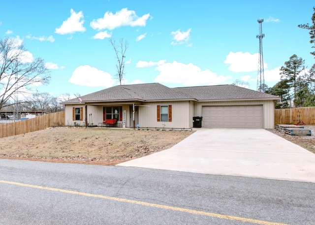 ranch-style home featuring a garage