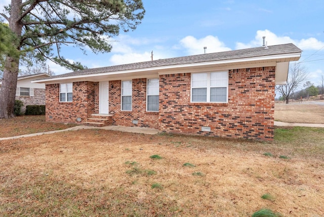 view of front of home featuring a front yard