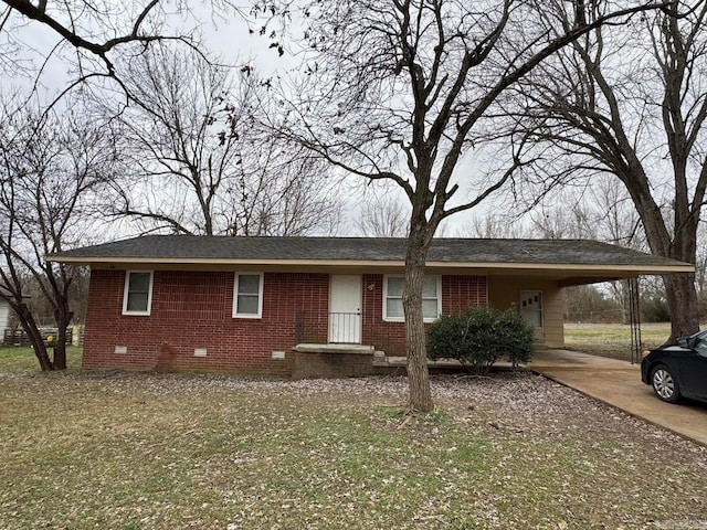 single story home featuring a carport