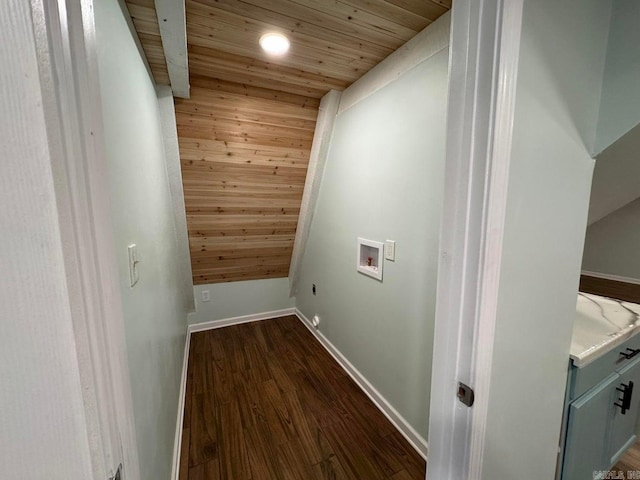 laundry room with washer hookup, wood walls, dark hardwood / wood-style flooring, and wood ceiling