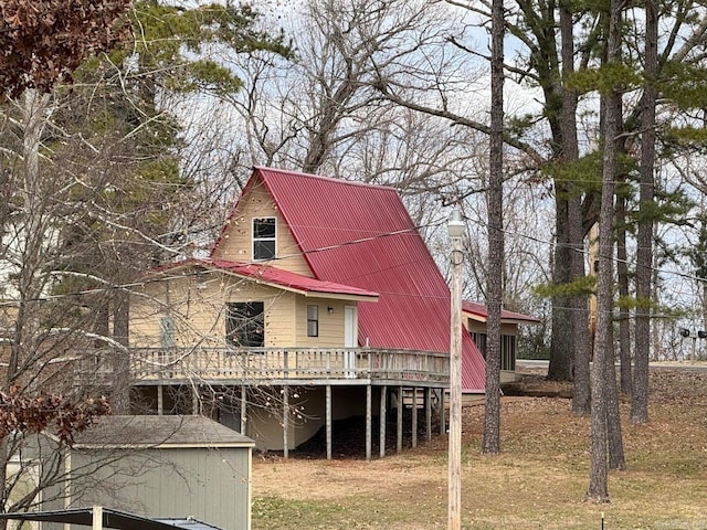 rear view of property with a deck