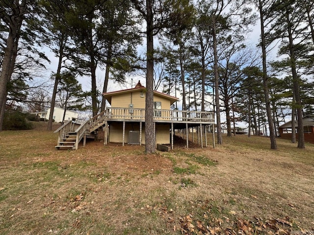 rear view of house featuring a deck