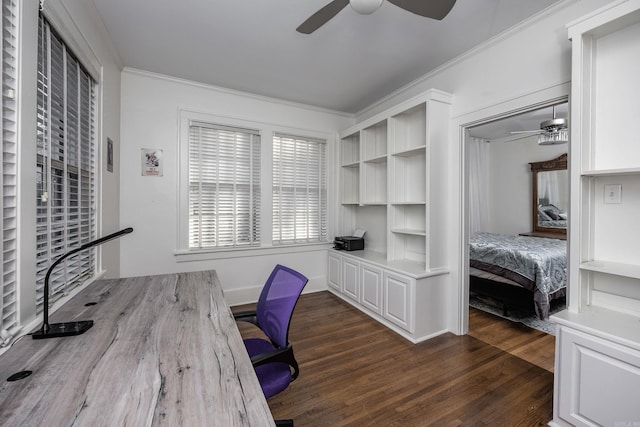 office space featuring ornamental molding, ceiling fan, and dark wood-type flooring