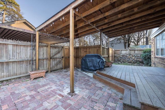 wooden deck with area for grilling