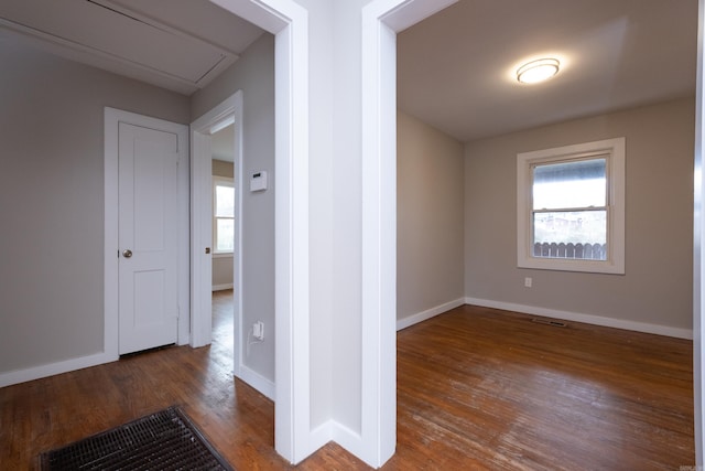 spare room with hardwood / wood-style floors and a wealth of natural light