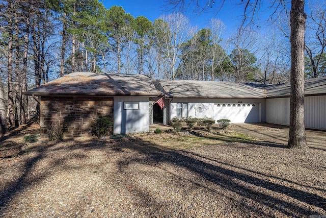 ranch-style home with a garage