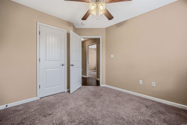 unfurnished bedroom with ceiling fan and carpet floors