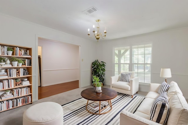 carpeted living room with crown molding and a notable chandelier