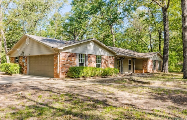 single story home with a garage