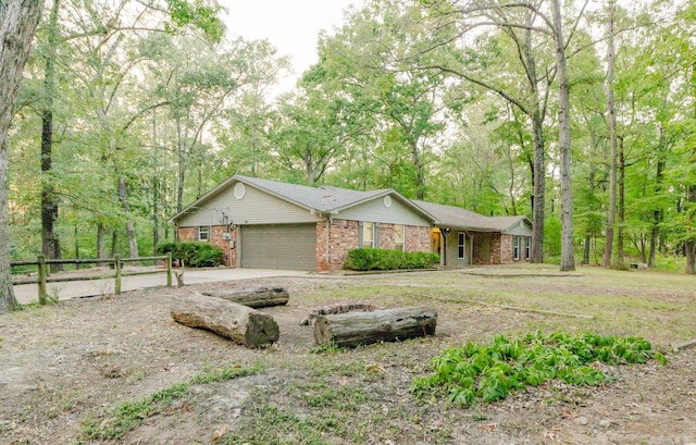 single story home featuring a garage