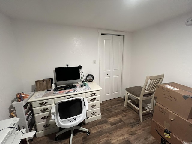 office space with dark hardwood / wood-style flooring