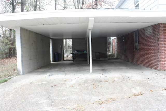 view of vehicle parking with a carport