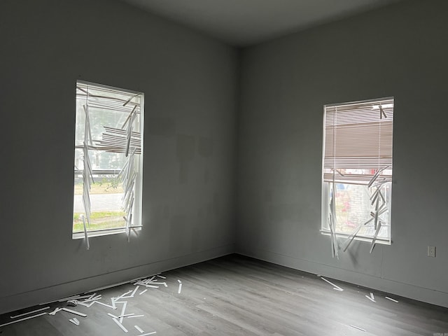 unfurnished room with light hardwood / wood-style flooring