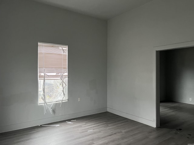 spare room featuring hardwood / wood-style flooring