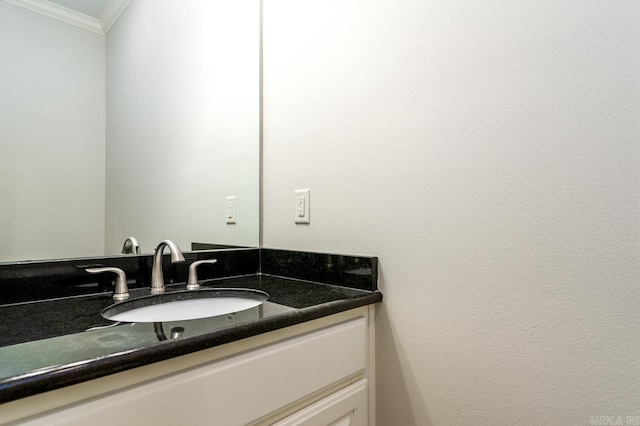 bathroom featuring vanity and crown molding