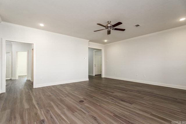 spare room with ceiling fan, dark hardwood / wood-style flooring, and ornamental molding