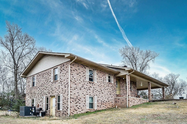 view of home's exterior featuring cooling unit