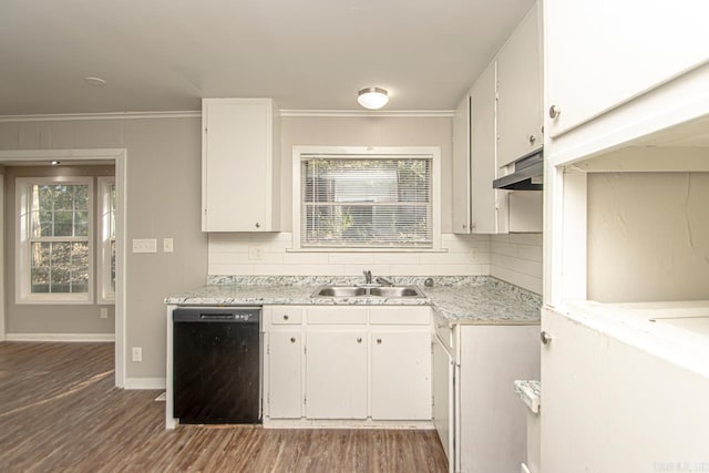 kitchen with dishwasher, decorative backsplash, white cabinetry, and sink