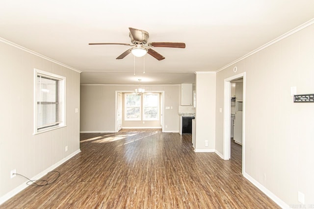 unfurnished living room featuring ceiling fan with notable chandelier, ornamental molding, and dark wood-type flooring