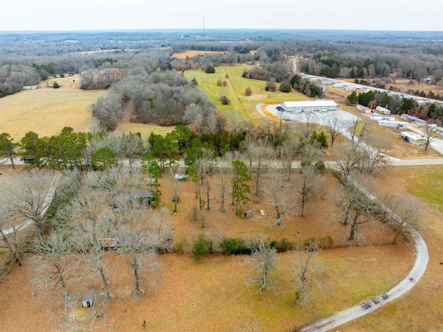 birds eye view of property featuring a rural view