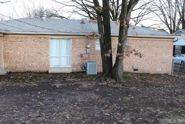 view of side of home with cooling unit