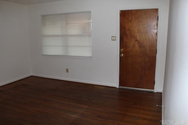 interior space with dark hardwood / wood-style flooring