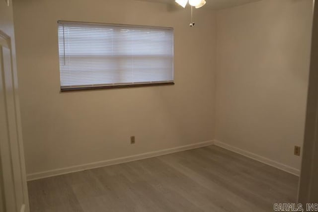 spare room featuring hardwood / wood-style flooring