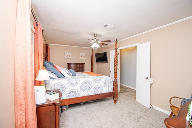 bedroom featuring light carpet, ceiling fan, and crown molding